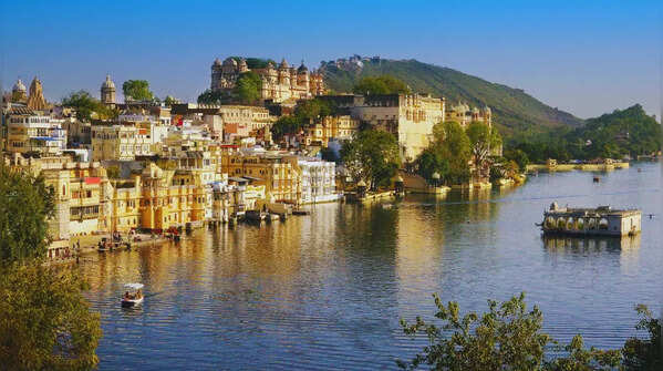 Rooftop dining with a view of Udaipur's stunning sunset