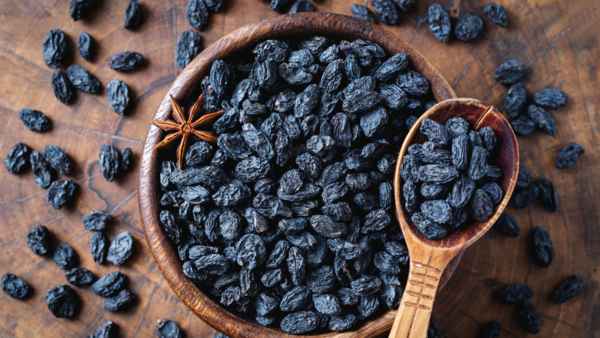 Soaked black raisins for digestion